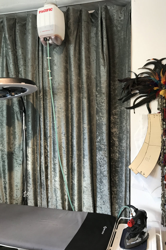 Gravity Iron and Curtain Gravity Fed Iron in front of curtain