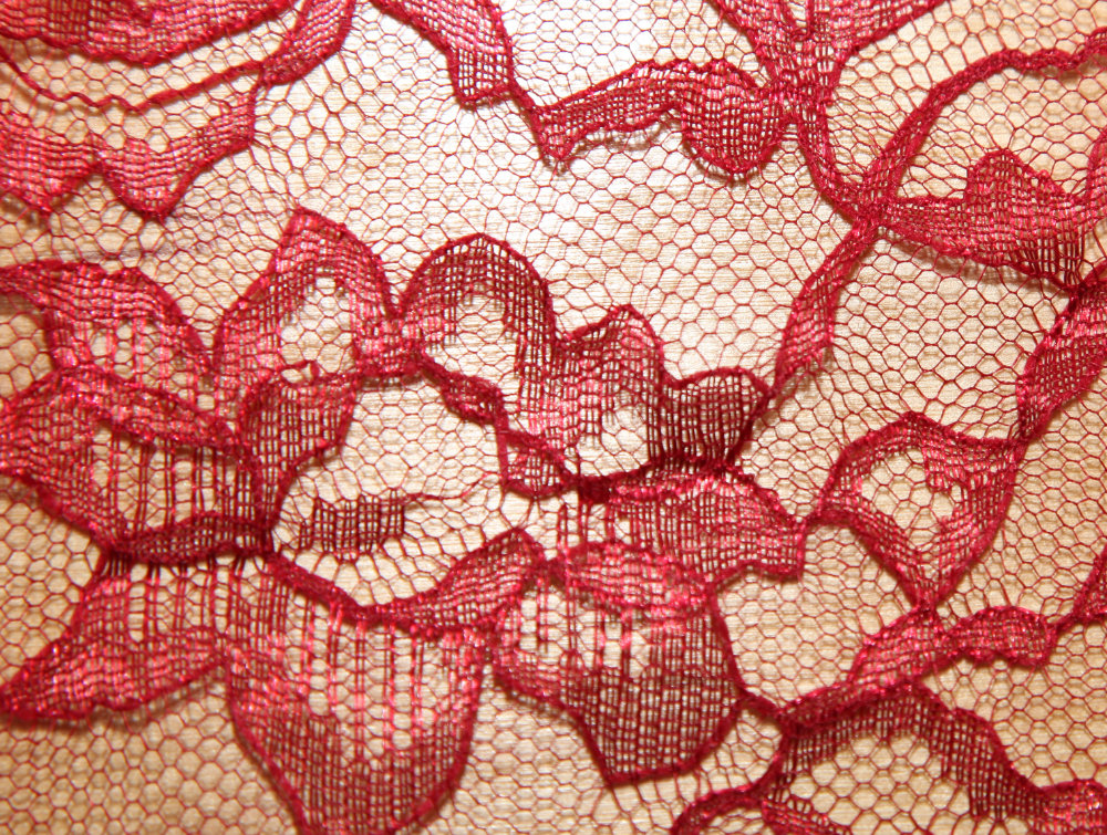 red lace fabric that you can see the table underneath through. Transparency is one thing to consider when choosing fabric for your projects