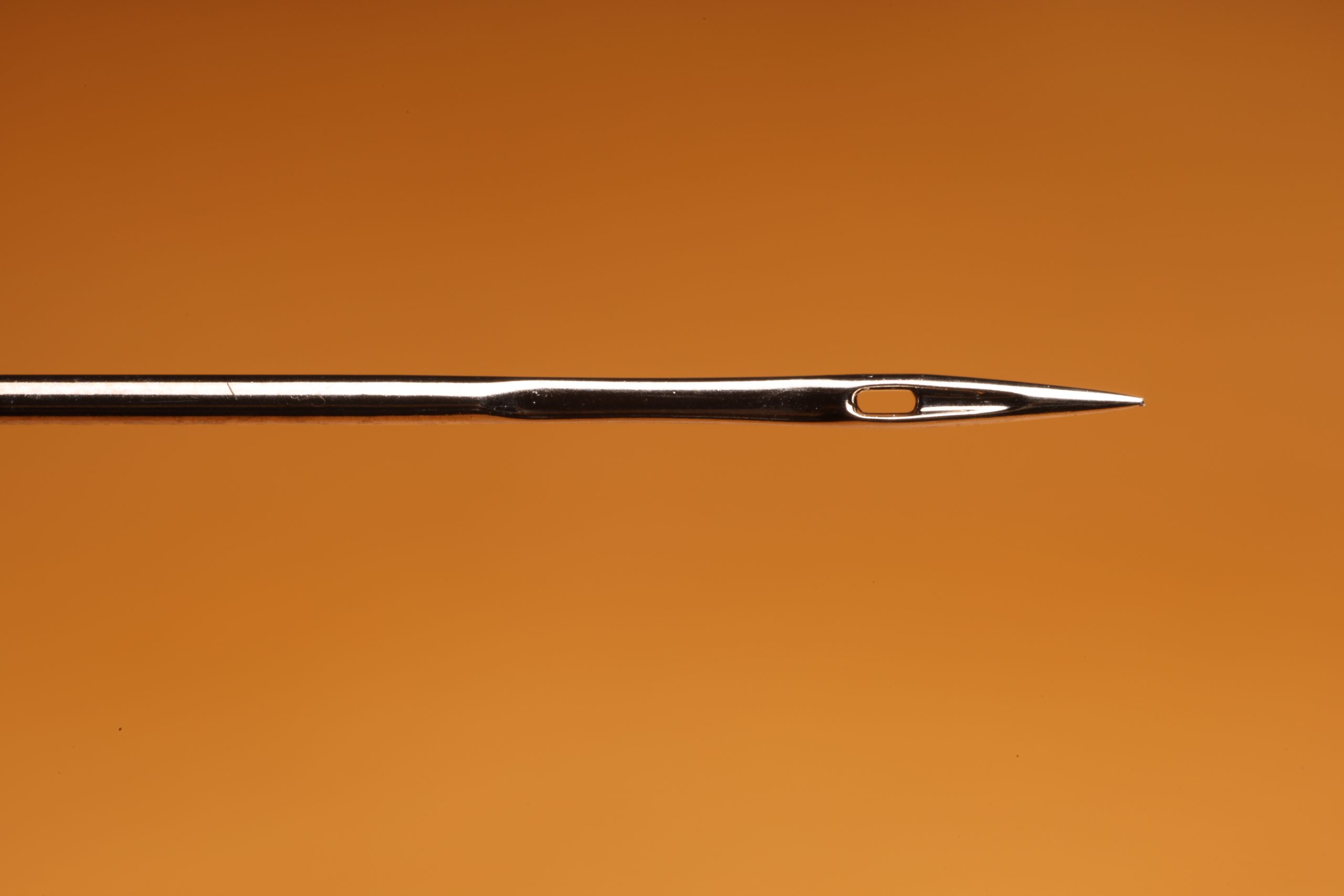 Used Orange Before Strawberry BV4A5020 Slightly damaged needle tip that is indication of needing to replace your sewing machine needle